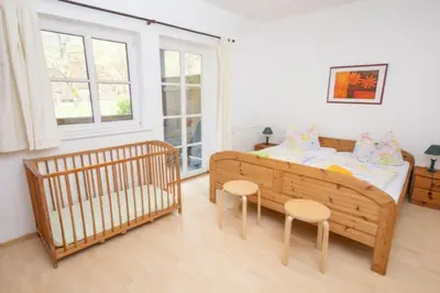 Ein Bett oder Betten in einem Zimmer der Unterkunft Ferienwohnung Nexö, 85 qm, 3 Schlafzimmer N2