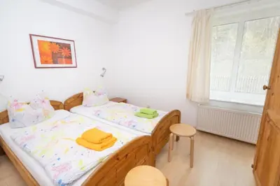 Ein Bett oder Betten in einem Zimmer der Unterkunft Ferienwohnung Nexö, 85 qm, 3 Schlafzimmer N2
