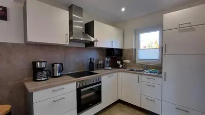 Küche/Küchenzeile in der Unterkunft Premiumhaus DeLuchs