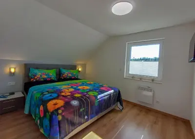Ein Bett oder Betten in einem Zimmer der Unterkunft Premiumhaus Hygge