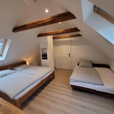 Ein Bett oder Betten in einem Zimmer der Unterkunft Altstadthäuschen