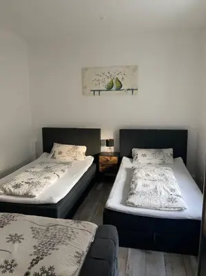 Ein Bett oder Betten in einem Zimmer der Unterkunft Bronzetaler