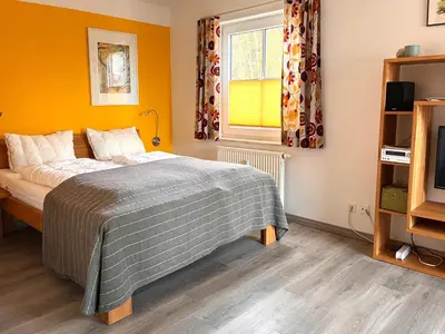 Ein Bett oder Betten in einem Zimmer der Unterkunft Apartment Heller am Hasselkopf