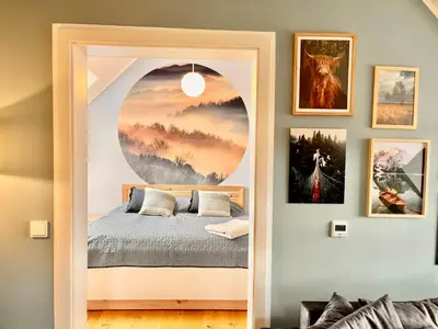 Ein Bett oder Betten in einem Zimmer der Unterkunft HOMELIKESTAY: Ferienwohnungen - Wernigerode - WLAN - Bestlage - liebevolle Einrichtung