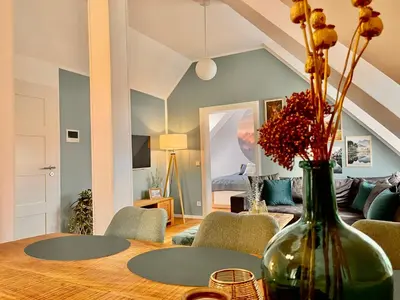 Ein Sitzbereich in der Unterkunft HOMELIKESTAY: Ferienwohnungen - Wernigerode - WLAN - Bestlage - liebevolle Einrichtung