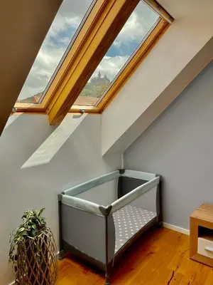 Ein Bett oder Betten in einem Zimmer der Unterkunft HOMELIKESTAY: Ferienwohnungen - Wernigerode - WLAN - Bestlage - liebevolle Einrichtung