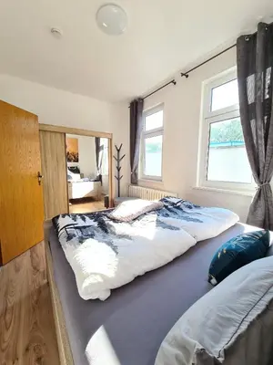 Ein Bett oder Betten in einem Zimmer der Unterkunft Fewo zur Dampflok