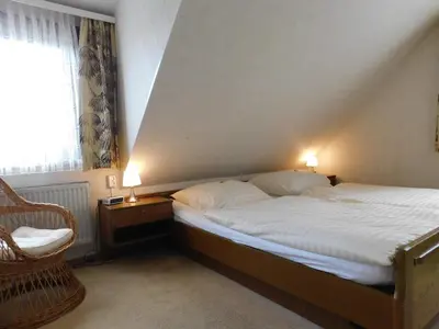 Ein Bett oder Betten in einem Zimmer der Unterkunft Pension Haus Petra