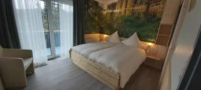 Ein Bett oder Betten in einem Zimmer der Unterkunft Pension Haus Petra