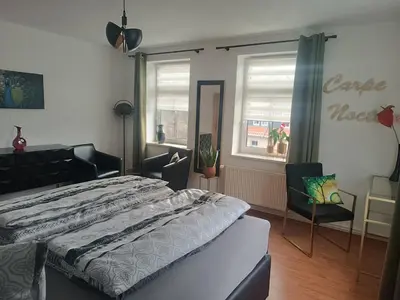 Ein Bett oder Betten in einem Zimmer der Unterkunft Brockensicht