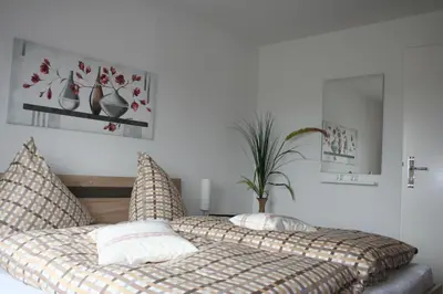 Ein Bett oder Betten in einem Zimmer der Unterkunft Ferienwohnung Hexentanz