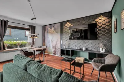 Ein Sitzbereich in der Unterkunft STANMA Luchspartment ruhig und zentral mit großem Balkon und Parkplatz