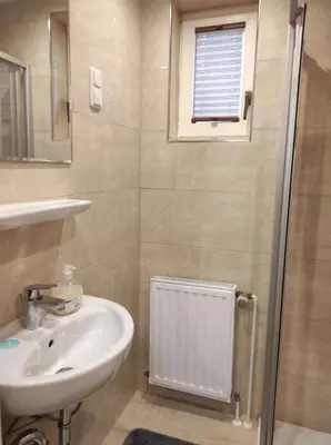 Ein Badezimmer in der Unterkunft Gästehaus Harzklause 1