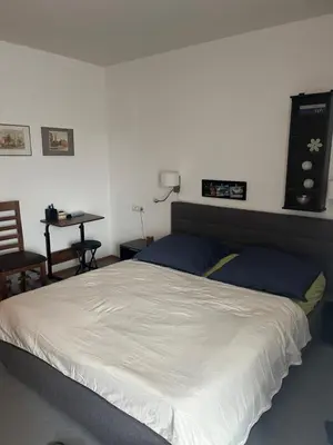 Ein Bett oder Betten in einem Zimmer der Unterkunft Harznest 2