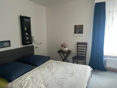 Ein Bett oder Betten in einem Zimmer der Unterkunft Harznest 2