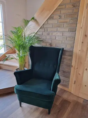 Ein Sitzbereich in der Unterkunft Ferienhaus zum Holzmichel