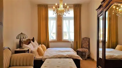 Ein Bett oder Betten in einem Zimmer der Unterkunft Superior Komfort Suite 90m2 bis 5 Personen im Jugendstil - Gründerzeit Villa im Harz