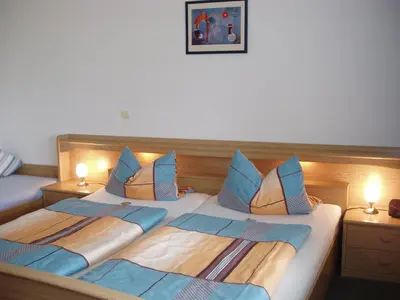 Ein Bett oder Betten in einem Zimmer der Unterkunft Pension Alfa