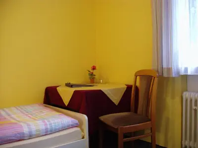 Ein Bett oder Betten in einem Zimmer der Unterkunft Pension Alfa