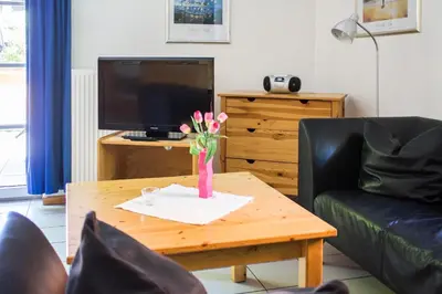 Ein Sitzbereich in der Unterkunft Ferienwohnung Ferienhäuser am Brocken, 60 qm 2 Schlafzimmer