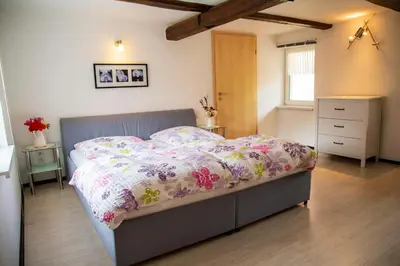 Ein Bett oder Betten in einem Zimmer der Unterkunft Ferienhaus Simone