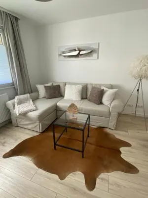Ein Sitzbereich in der Unterkunft Harzperle 1 II zentrales 3 Zi Apartment II Familien