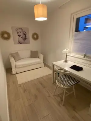 Ein Sitzbereich in der Unterkunft Harzperle 2 II zentrales 3 Zi Apartment II Familien