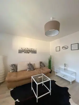 Ein Sitzbereich in der Unterkunft Harzperle 2 II zentrales 3 Zi Apartment II Familien