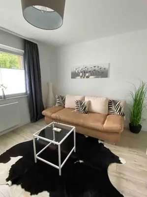 Ein Sitzbereich in der Unterkunft Harzperle 2 II zentrales 3 Zi Apartment II Familien