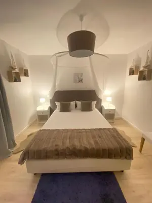 Ein Bett oder Betten in einem Zimmer der Unterkunft Harzperle 3 II zentrales 3 Zi Apartment II Familien
