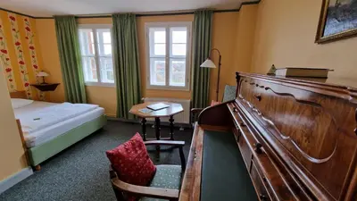 Ein Bett oder Betten in einem Zimmer der Unterkunft Kloster Drübeck