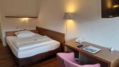 Ein Bett oder Betten in einem Zimmer der Unterkunft Kloster Drübeck
