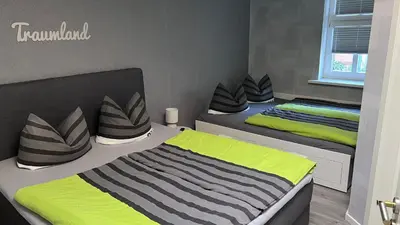 Ein Bett oder Betten in einem Zimmer der Unterkunft Altstadt Fewo Wernigerode
