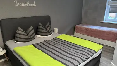 Ein Bett oder Betten in einem Zimmer der Unterkunft Altstadt Fewo Wernigerode