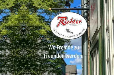 Ein Zertifikat, Auszeichnung, Logo oder anderes Dokument, das in der Unterkunft Richter Altstadtappartements ausgestellt ist