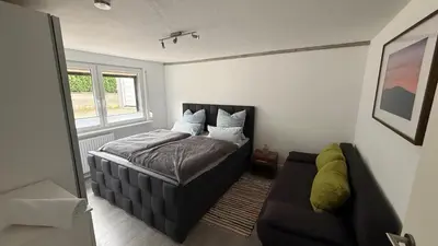 Ein Bett oder Betten in einem Zimmer der Unterkunft Ferienwohnung Bad Harzburg Grubenweg 34