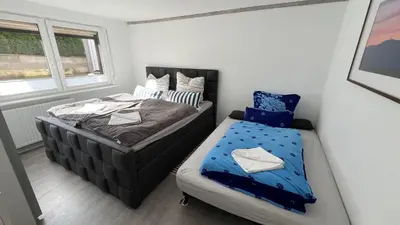 Ein Bett oder Betten in einem Zimmer der Unterkunft Ferienwohnung Bad Harzburg Grubenweg 34