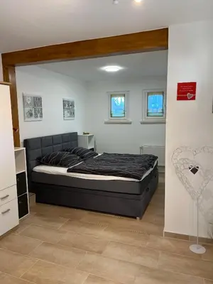 Ein Sitzbereich in der Unterkunft Ferienhaus Waldoase