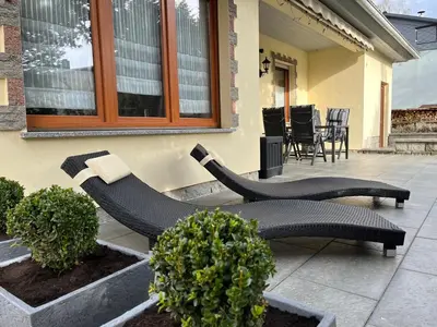 Ein Sitzbereich in der Unterkunft Ferienhaus Waldoase