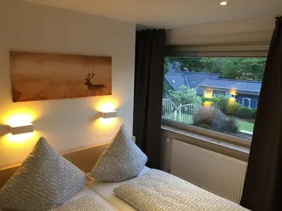 Ein Bett oder Betten in einem Zimmer der Unterkunft Goethestraße Ferienhaus
