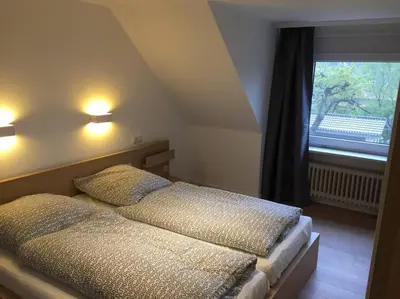 Ein Bett oder Betten in einem Zimmer der Unterkunft Goethestraße Ferienhaus