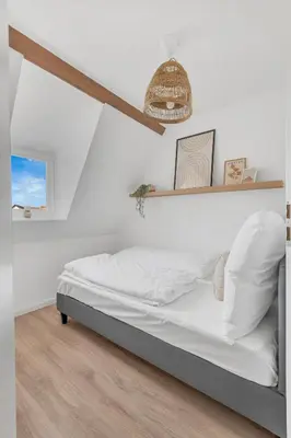 Ein Bett oder Betten in einem Zimmer der Unterkunft Superb - Schlossblick - Zentral - Smart TV