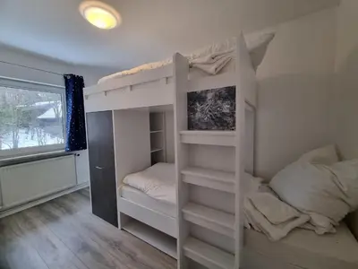 Ein Bett oder Betten in einem Zimmer der Unterkunft Haus Peter Wohnung 5