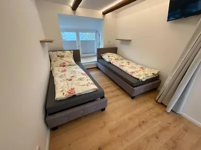 Ein Bett oder Betten in einem Zimmer der Unterkunft Ferienhaus im Altstadtzentrum