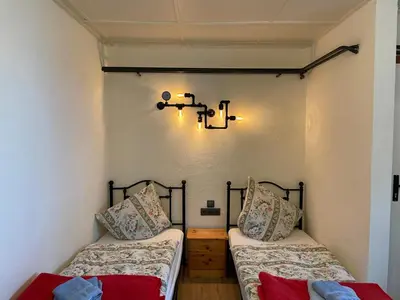 Ein Bett oder Betten in einem Zimmer der Unterkunft Hotel Mühlental