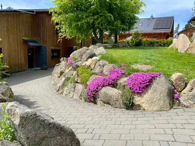 Ein Garten an der Unterkunft Naturstammhaus und Appartements Zum Brockenbaecker