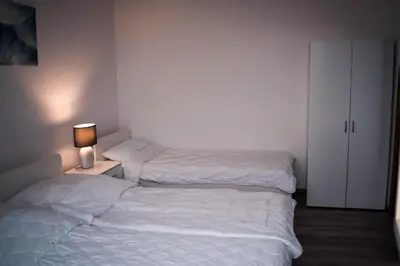 Ein Bett oder Betten in einem Zimmer der Unterkunft Penthouse Brockenblick 381