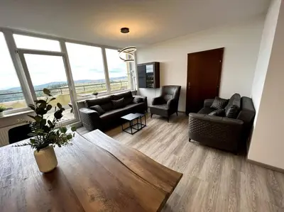 Ein Sitzbereich in der Unterkunft Penthouse Brockenblick 381
