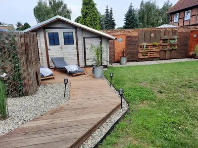 Ein Garten an der Unterkunft Melli