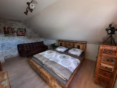 Ein Bett oder Betten in einem Zimmer der Unterkunft Melli